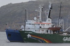 Russia switches Greenpeace activists' charges from piracy to 'hooliganism'
