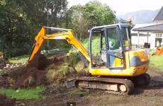 Two-year-old boy drives full-size digger