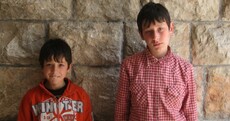 Taken from their home, blindfolded and interrogated - for 'throwing stones'