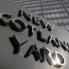 Police arrest two News of the World journalists over phone hacking