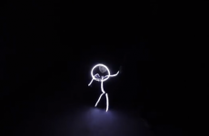 Little girl goes trick-or-treating in amazing LED lightsuit