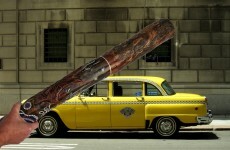 Man arrested for attacking taxi with didgeridoo