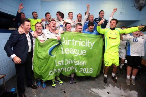 Collins and the Athlone players celebrating their First Division win in September. 
