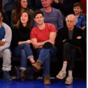 Larry David could not look any unhappier at having to attend NBA game