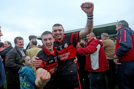 Mount Leinster's Michael Doyle and Gary Kelly celebrate after the game.