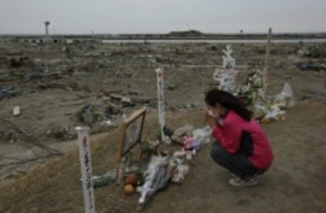Slideshow: Japan commemorates month anniversary of disaster