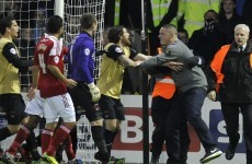 Swindon fan loses his marbles and punches Leyton Orient goalkeeper