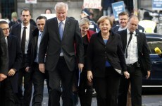After two months, Merkel forms coalition government in Germany