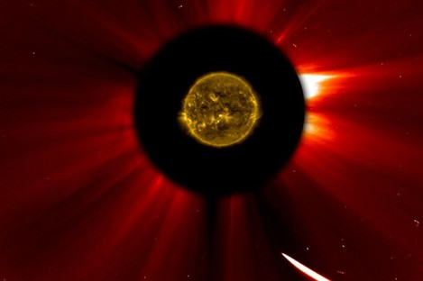 In a composite image provided by NASA, Comet ISON nears the sun.