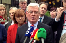 Gilmore warns health bodies could have funding cut if they don't comply with pay policy