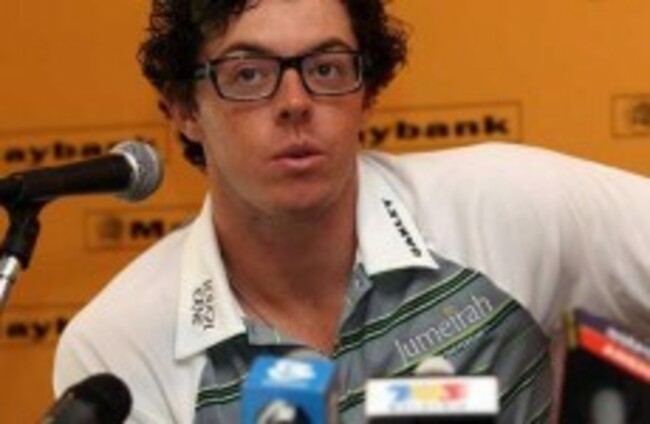 Rory McIlroy arrives in Malaysia without his clubs but with a new trendy look