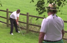 Amateur golfer plays crazy escape shot off a fence... to within a couple of feet