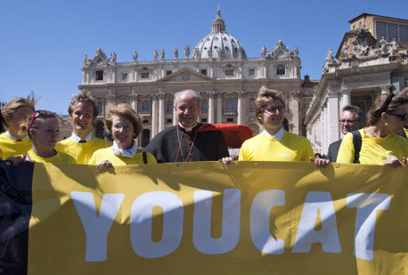 Archbishop of Vienna Cardinal Christoph Schoenborn, centre, at the launch of the YouCat catechism book today. 