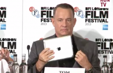 Tom Hanks brilliantly steals an iPad in front of a room of journalists