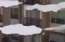 Thawing ice falling from apartment block is strangely satisfying
