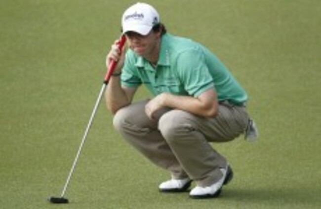 McIlroy shoots 64 to move into the lead in Malaysia