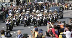 Mandela's body lying in state after solemn journey through Pretoria