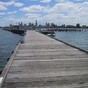 Woman accidentally walks off pier while checking Facebook on her phone
