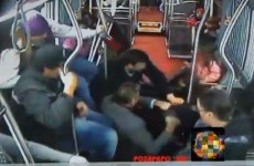 Bus passengers join together to overpower armed robber