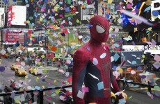 Spider-Man Checking Out Confetti in Times Square Pic of the Day