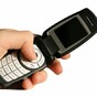 Disappointed mugger hands retro flip phone back to victim