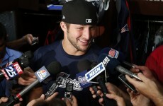 ESPN has hired Tim Tebow