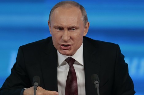 File: Putin speaking on 19 December 2013 at his annual news conference. 