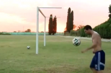 Lionel Messi scores from behind the goal in training