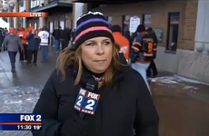 Fan tries to videobomb reporter, falls amusingly on his arse