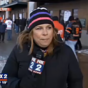 Fan tries to videobomb reporter, falls amusingly on his arse