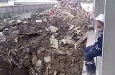 Construction worker lights cigarette in the most incredibly badass way