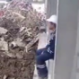 Construction worker lights cigarette in the most incredibly badass way