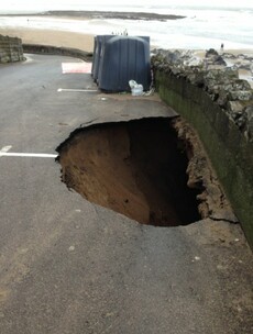 We thought that earlier pothole was big but then we saw this one...