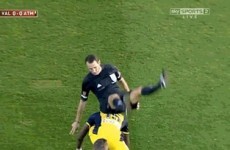 GIF: Atletico Madrid player comically trips up referee while tying his lace