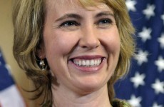 Gabrielle Giffords is 'standing on her own', doctors say