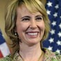 Gabrielle Giffords is 'standing on her own', doctors say