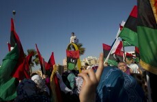 Buildings 'badly damaged' in aerial strike on Gaddafi compound