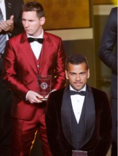 Leo Messi continues his 'brave' fashion choices with resplendent red suit