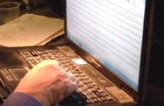 Guy amusingly falls asleep with his finger on the slash key