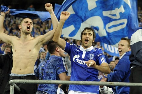 Raul celebrates with Schalke fans following the German side's quarter-final victory against Inter Milan.