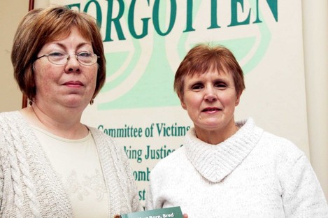 File: Marian Walsh who son was murdered by loyalists with Margaret Urwin Group Secretary at the Justice for the Forgotten offices