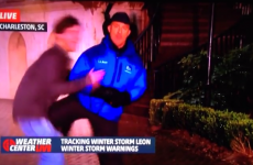Weatherman gets attacked during live report, knees the guy in the balls