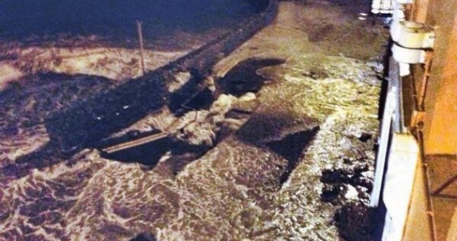 Flooding has collapsed a road in Kinsale