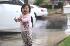 Little girl experiences rain for the first time, reacts adorably