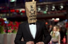 Shia LaBeouf arrives on red carpet with a paper bag over his head