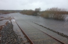 Rail track that was raised by 60 centimetres... is now 50 centimetres under water