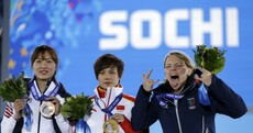 Snapshot: Speed skating champ takes gold medal in her stride, runner-up goes nuts