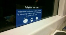 Extreme Daily Mail burn spotted on a train to London