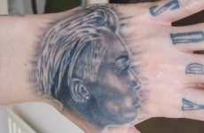 That lad with all the Miley Cyrus tattoos got another one