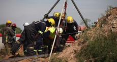Hundreds feared trapped in South Africa mine collapse, 11 rescued